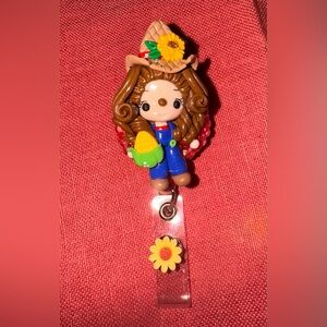 Charming Doll Keychain with Blue Overalls and Brown Hair